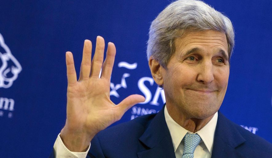 This Aug. 4, 2015, file photo shows U.S. Secretary of State John Kerry waving after delivering a speech at Singapore Management University in Singapore. (Brendan Smialowski/Pool Photo via AP)