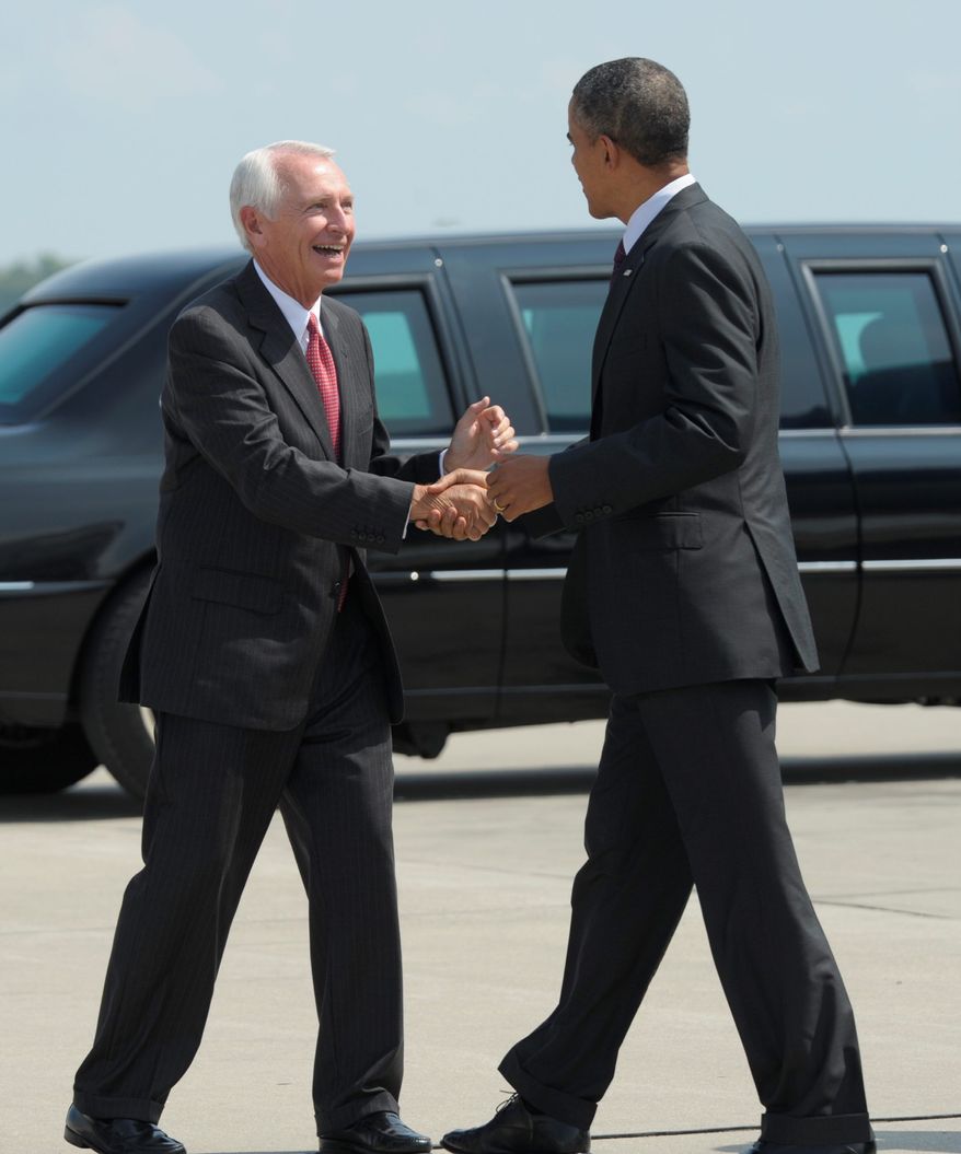 Kentucky Gov. Steve Beshear is working with President Obama as part of a "core group" on climate policy. Publicy, he opposes many environmental regulations. (Associated Press)