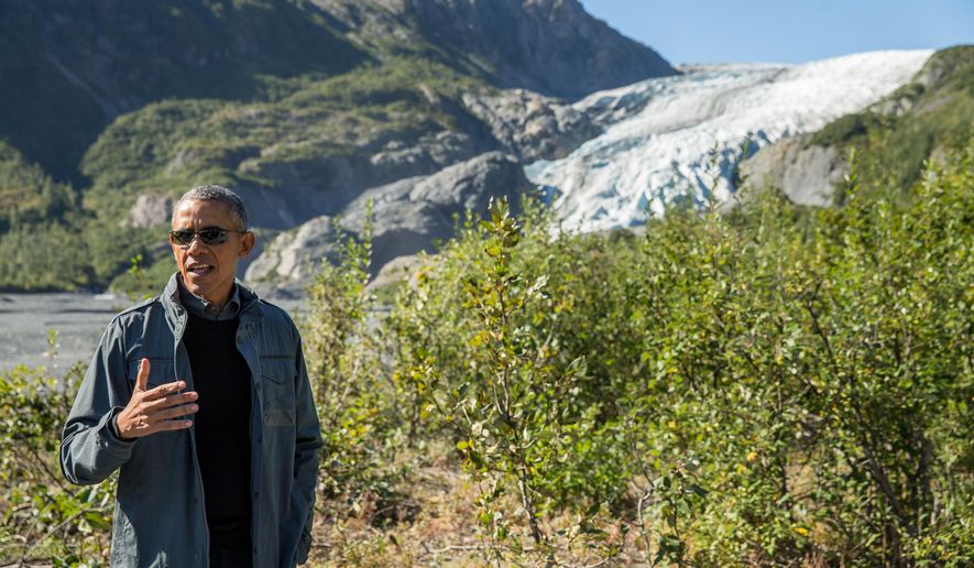 President Obama speaks to members of the media while on a hike to the Exit Glacier in Seward, Alaska, on Sept. 1, 2015, which according to National Park Service research, has retreated approximately 1.25 miles over the past 200 years. Obama is on a historic three-day trip to Alaska aimed at showing solidarity with a state often overlooked by Washington, while using its glorious but changing landscape as an urgent call to action on climate change. (Associated Press) **FILE**