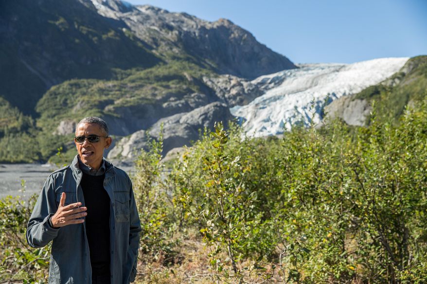 President Obama speaks to members of the media while on a hike to the Exit Glacier in Seward, Alaska, on Sept. 1, 2015, which according to National Park Service research, has retreated approximately 1.25 miles over the past 200 years. Obama is on a historic three-day trip to Alaska aimed at showing solidarity with a state often overlooked by Washington, while using its glorious but changing landscape as an urgent call to action on climate change. (Associated Press) **FILE**