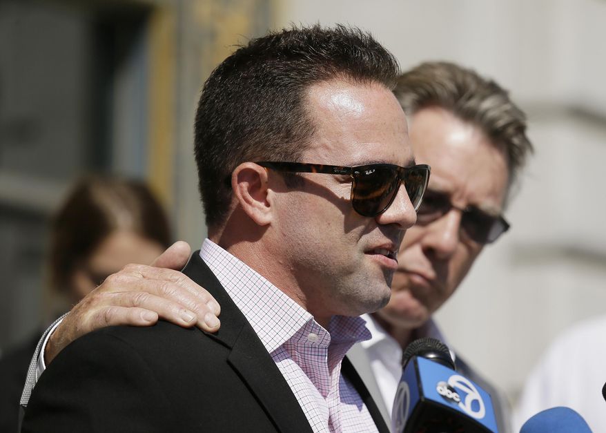 Brad Steinle, left, and Jim Steinle, right, the brother and father of Kathryn Steinle, answer questions during a news conference on the steps of City Hall Tuesday, Sept. 1, 2015, in San Francisco. The parents of the San Francisco woman shot to death by a man being sought for deportation filed legal claims against San Francisco and federal officials in connection with her killing. Kathryn Steinle was shot to death on Pier 14 on July 1 as she walked with her father. (AP Photo/Eric Risberg)