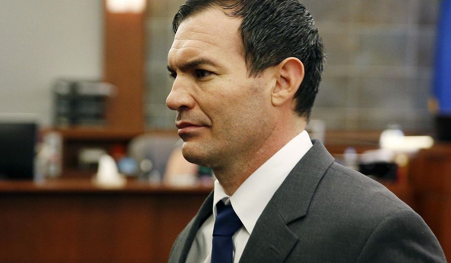 George Tiaffay walks out of court Thursday, Sept. 3, 2015, in Las Vegas. Tiaffay was convicted of murder for hiring a homeless man to kill his wife Shauna Tiaffay nearly three years ago.(AP Photo/John Locher)