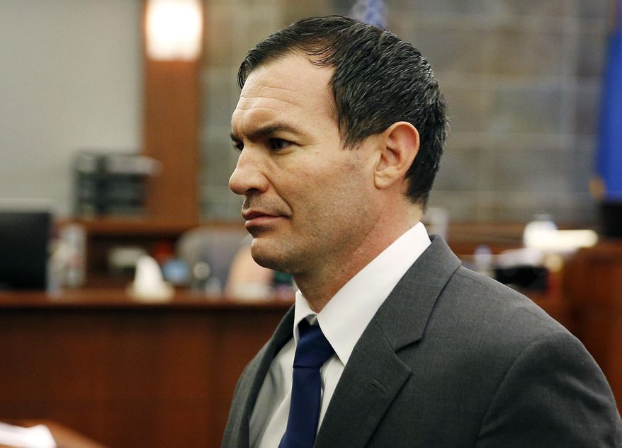 George Tiaffay walks out of court Thursday, Sept. 3, 2015, in Las Vegas. Tiaffay was convicted of murder for hiring a homeless man to kill his wife Shauna Tiaffay nearly three years ago.(AP Photo/John Locher)