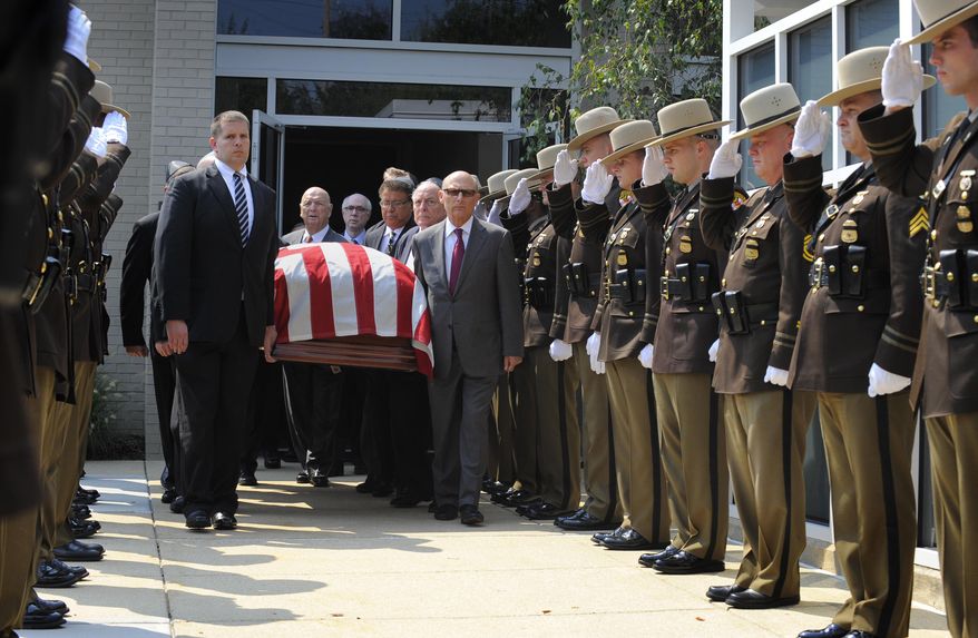Pallbearers carry the casket of former Gov. Marvin Mandel as they exit the Sol Levinson & Brothers Funeral Home in Pikesville, Md., Thursday, Sept. 3, 2015. Maryland politicians from both parties remembered Mandel on Thursday for his lasting innovations to state government and his quiet but highly effective talent for politics. (Lloyd Fox /The Baltimore Sun via AP) WASHINGTON EXAMINER OUT; MANDATORY CREDIT