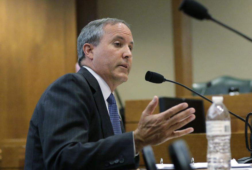 FILE - In this Wednesday, July 29, 2015 file photo, Texas Attorney General Ken Paxton speaks during a hearing in Austin, Texas. (AP Photo/Eric Gay, File)