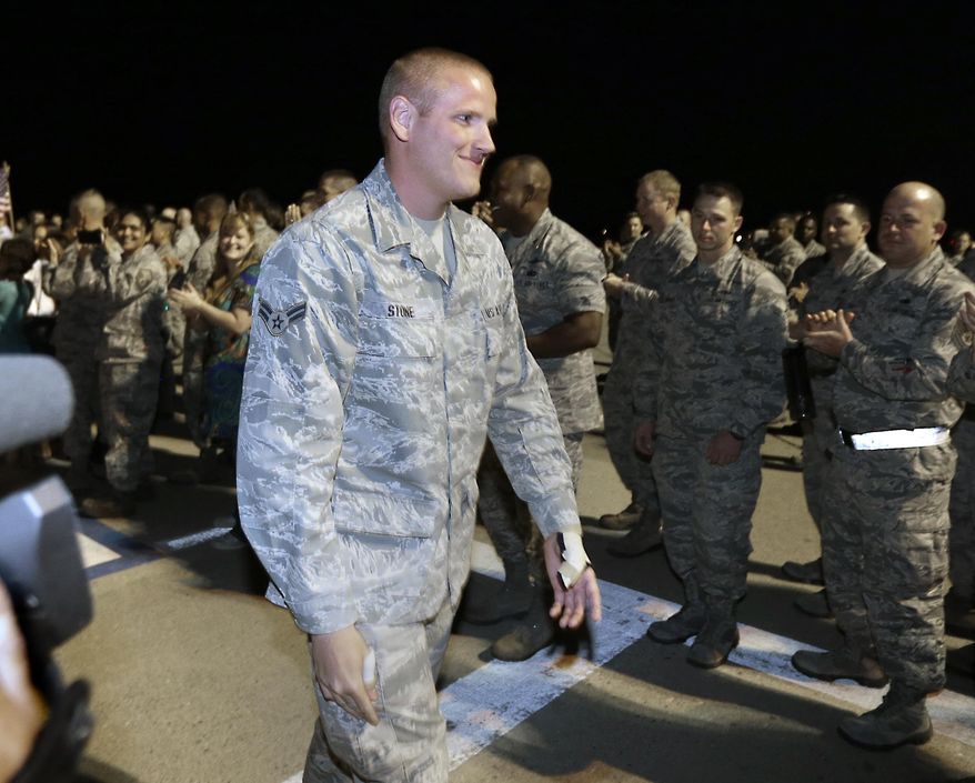 U.S. Air Force Airman 1st Class Spencer Stone, one of three Americans that tackled a heavily armed gunman on a Paris-bound train,is greeted by well-wishers after arriving at Travis Air Force Base in Fairfield, Calif., Thursday, Sept. 3, 2015.  Stone, who has been undergoing medical treatment in Germany since he and his two childhood friends,  National Guardsman Alek Skarlatos and Sacramento college student Anthony Sadler subdued the gunman on a passenger train Aug. 21.(AP Photo/Rich Pedroncelli)