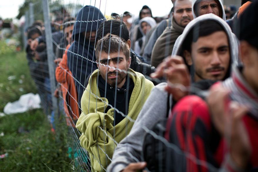 Hungary relents and allows a swarm of migrants and refugees without visas to use public transportation to travel to Austria and Germany. Story, A8. (Associated Press)