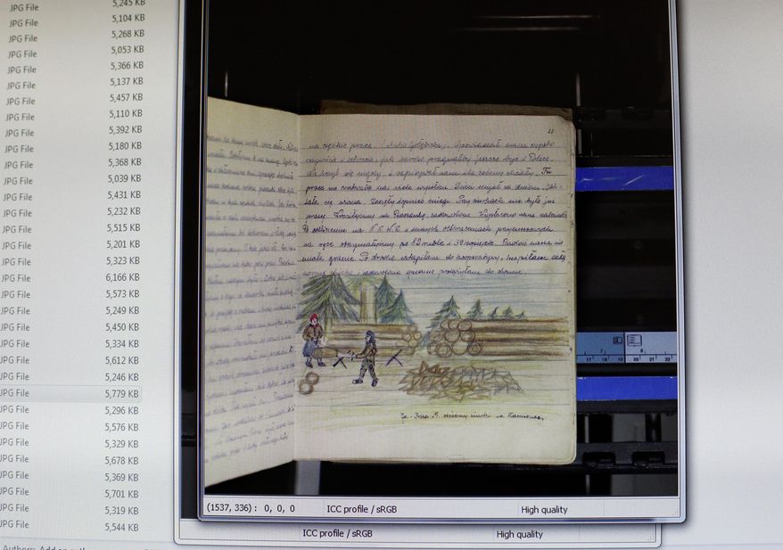 This Aug. 31, 2015, photo, shows a digitized copy of a diary by longtime Toledo resident Elizabeth Frankowski at the Toledo-Lucas County Public Library in Toledo, Ohio. Frankowski's diary documenting life in a Soviet labor camp more than 70 years ago is now available for the public to read, thanks to a digital preservation project by the Toledo-Lucas County Public Library. (Amy E. Voigt/The Blade via AP) MANDATORY CREDIT; MAGS OUT; NO SALES; TV OUT; SENTINEL-TRIBUNE OUT; MONROE EVENING NEWS OUT; TOLEDO FREE PRESS OUT