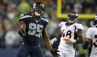 Seattle Seahawks tight end Anthony McCoy reacts after a play against the Denver Broncos in the second half of a preseason NFL football game, Friday, Aug. 14, 2015, in Seattle. (AP Photo/John Froschauer)