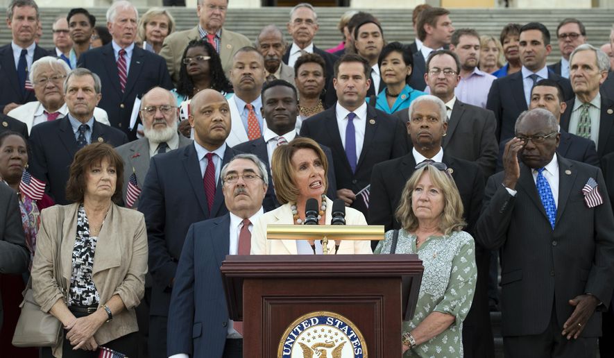 House Minority Leader Nancy Pelosi, D-Calif., speaks with democratic members of congress and other guests in favor of the Iran nuclear agreement at the U.S. Capitol in Washington, Tuesday, Sept. 8, 2015. The agreement struck by Iran, the U.S., China, Russia, France, Britain and Germany in July would provide Iran hundreds of billions of dollars in relief from international sanctions in exchange for a decade of constraints on the country's nuclear program.(AP Photo/Molly Riley)