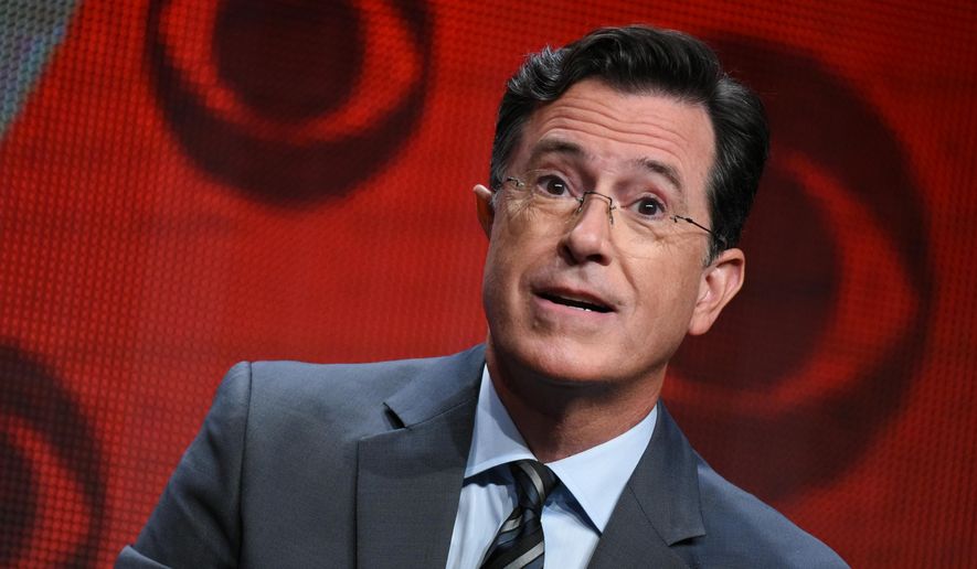 Stephen Colbert officially takes over for the retired David Letterman as host of "The Late Show" on CBS Tuesday, Sept. 8, 2015. (Photo by Richard Shotwell/Invision/AP, File)