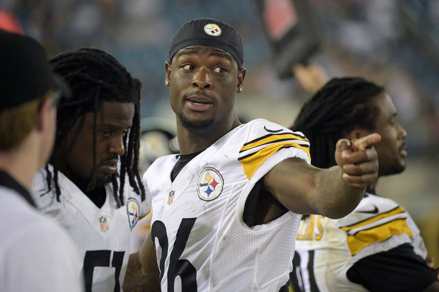 FILE - In this Aug. 14, 2015, file photo, Pittsburgh Steelers running back Le&#x27;Veon Bell, center, gestures on the sideline during the second half of an NFL preseason football game against the Jacksonville Jaguars in Jacksonville, Fla. Several teams will be missing key players when the NFL season kicks off this weekend.  (AP Photo/Phelan M. Ebenhack, File)