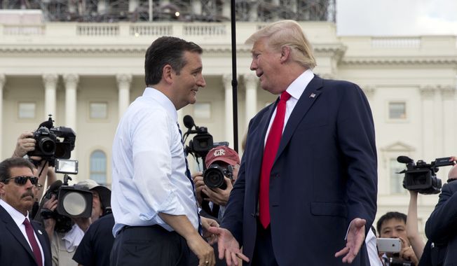Republican presidential candidates Donald Trump and Sen. Ted Cruz of Texas greet each other on stage during a Sept. 9, 2015, rally on Capitol Hill in Washington organized by Tea Party Patriots to oppose the Iran nuclear agreement. (Associated Press) **FILE**