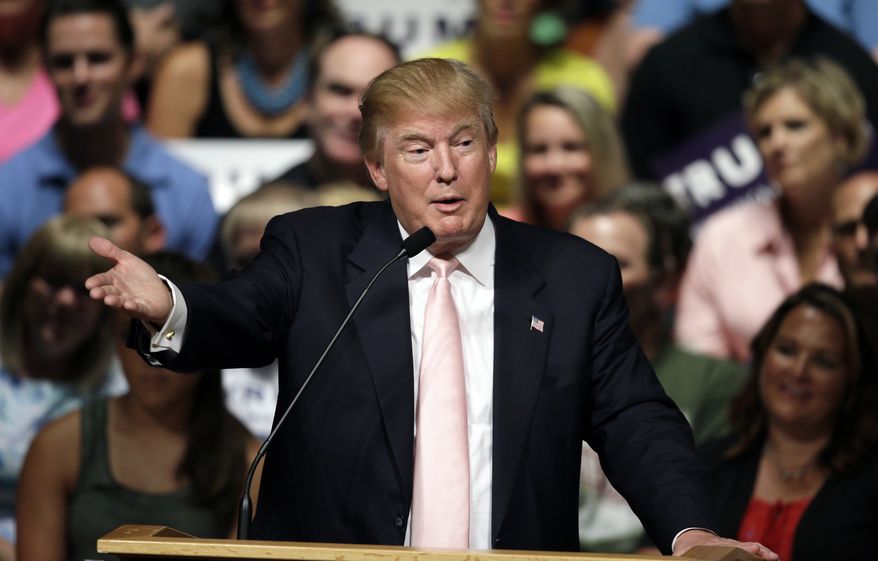 A Rolling Stone cover story, published online Wednesday, describes an incident in which Donald Trump and his staffers are watching TV news. When Carly Fiorina appears on camera, Trump says: "Look at that face! Would anyone vote for that? Can you imagine that, the face of our next president?!" (Associated Press)