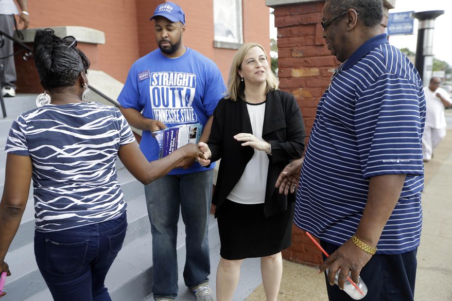 Nashville mayoral candidate Megan Barry campaigns Wednesday, Sept. 9, 2015, in Nashville, Tenn. Voters in the nation's 25th largest city go to the polls Thursday to decide between Councilwoman Barry and hedge fund manager David Fox. A closer-than-expected mayor's race in Nashville has Republicans hoping they can grab one of the last remaining major elected offices in Tennessee that has eluded their grasp amid a statewide GOP wave. (AP Photo/Mark Humphrey)