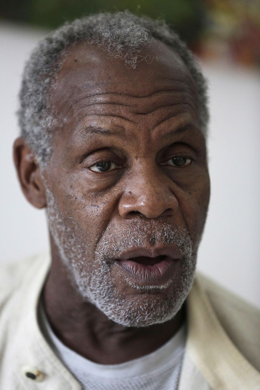 U.S actor Danny Glover speaks to The Associated Press during an interview in Lagos, Nigeria Thursday, Sept. 10, 2015. Glover is in Nigeria to star in a movie, "93 Days," based on people who risked and sacrificed their lives to stop the spread of Ebola in Africa's most populous country. (AP Photo/Sunday Alamba)