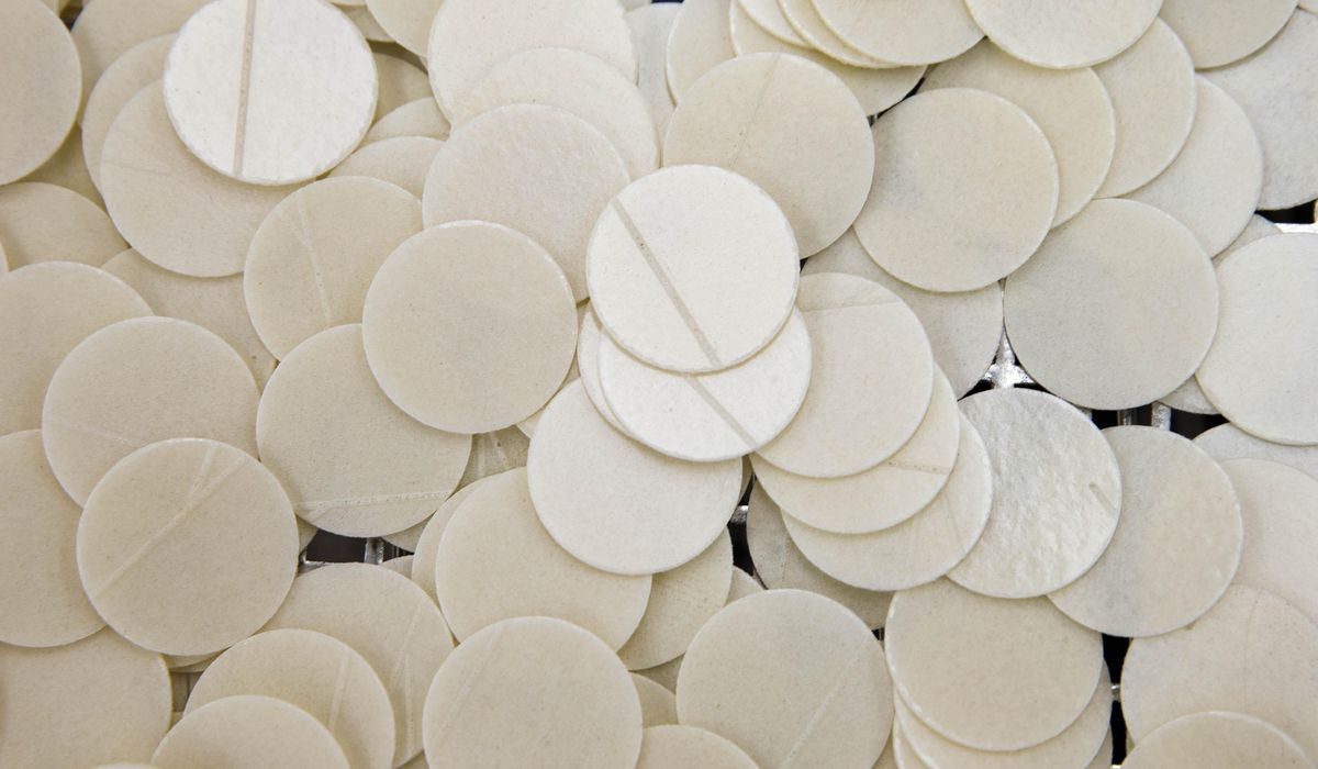 NextImg:Priest bites woman at Mass to stop her from taking Communion wafers