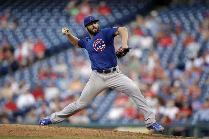 Chicago Cubs' Jake Arrieta pitches during the fifth inning of the first game of a baseball doubleheader against the Philadelphia Phillies, Friday, Sept. 11, 2015, in Philadelphia. (AP Photo/Matt Slocum)