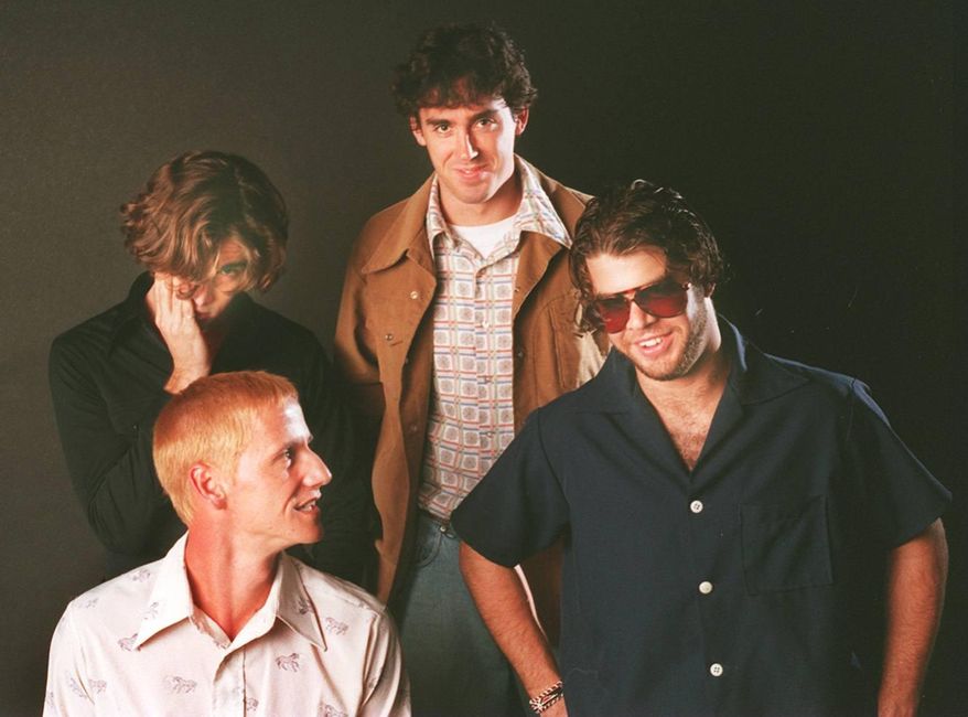 ADVANCE FOR WEEKEND EDITIONS, SEPT. 12-13 - In this photo taken in 1995, the Gainesville, Fla., band For Squirrels, with, from bottom left clockwise, drummer Jack Griego, vocalist John Francis "Jack" Vigliatura, bassist Bill White and guitarist Travis Tooke, pose for a photo in Gainesville, Fla. Family, friends are remembering For Squirrels, 20 years after a tragic car accident struck the band. on Sept. 8, 1995. (The Gainesville Sun via AP) THE INDEPENDENT FLORIDA ALLIGATOR OUT; MANDATORY CREDIT