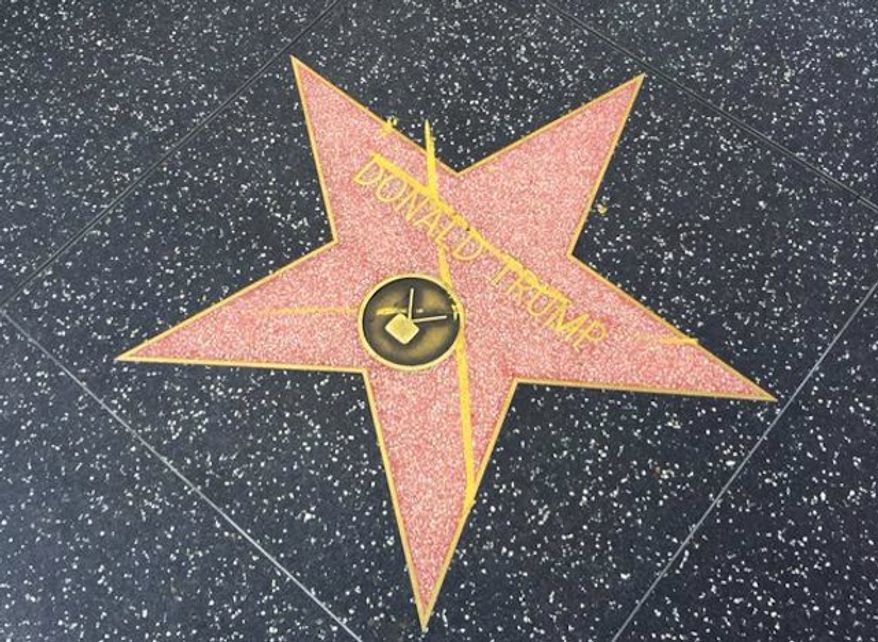 Donald Trump's Walk of Fame star on Hollywood Boulevard has been defaced with a large yellow X. IJ Review reporter Hunter Schwarz shared a photo of the graffiti Thursday afternoon. (Twitter/@HunterSchwarz)