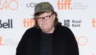 Director Michael Moore attends the &amp;quot;Where to Invade Next&amp;quot; premiere  on day 1 of the Toronto International Film Festival at The Princess of Wales Theatre on Thursday, Sept. 10, 2015, in Toronto. (Photo by Evan Agostini/Invision/AP)  ** FILE **