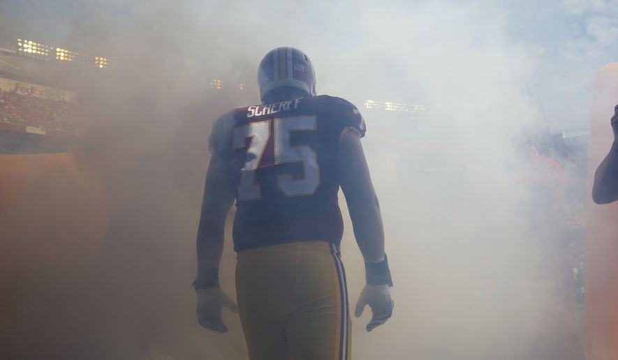 Washington Redskins offensive tackle Brandon Scherff (75) prepares to enter the field before an NFL football game against the Miami Dolphins, Sunday, Sept. 13, 2015, in Landover, Md. (AP Photo/Patrick Semansky)