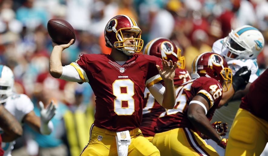 Washington Redskins quarterback Kirk Cousins (8) looks to pass during an NFL football game against the Miami Dolphins, Sunday, Sept. 13, 2015, in Landover, Md. (AP Photo/Patrick Semansky)