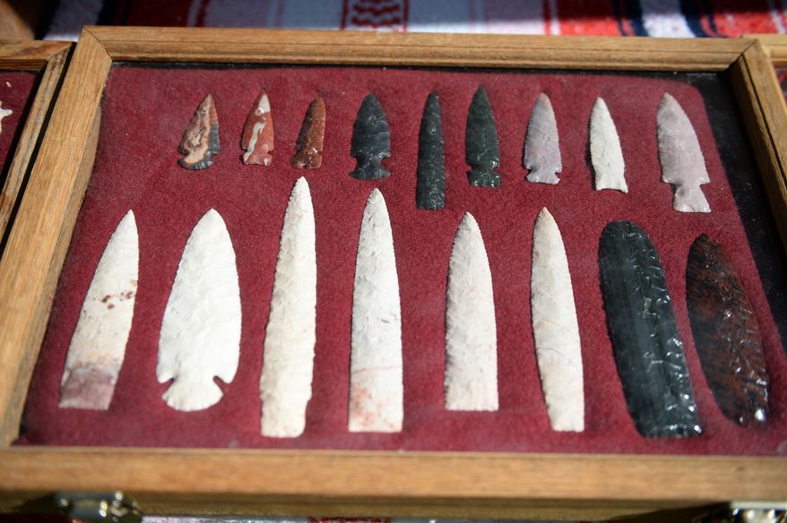 A set of arrowheads are displayed Sunday, Sept. 13, 2015, at Oakland Mills Nature Center in Mount Pleasant, Iowa. People from all over the state of Iowa practiced knapping, an ancient way to create tools such as arrowheads. (Jeff Brown/The Hawk Eye via AP)