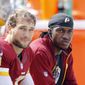 Washington Redskins quarterback Kirk Cousins (8) and quarterback Robert Griffin III, right, sit on the bench during the second half of an NFL football game against the Miami Dolphins, Sunday, Sept. 13, 2015, in Landover, Md. (AP Photo/Patrick Semansky)