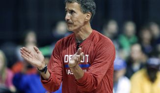 FILE - In this Oct. 5, 2013, file photo, Detroit Pistons strength and conditioning coach Arnie Kander claps during the Pistons NBA basketball camp at the Palace of Auburn Hills, Mich. The Minnesota Timberwolves hired the Kander on Monday, Sept. 14, 2015,  to head their revamped athletic training staff.  (AP Photo/Carlos Osorio, File)