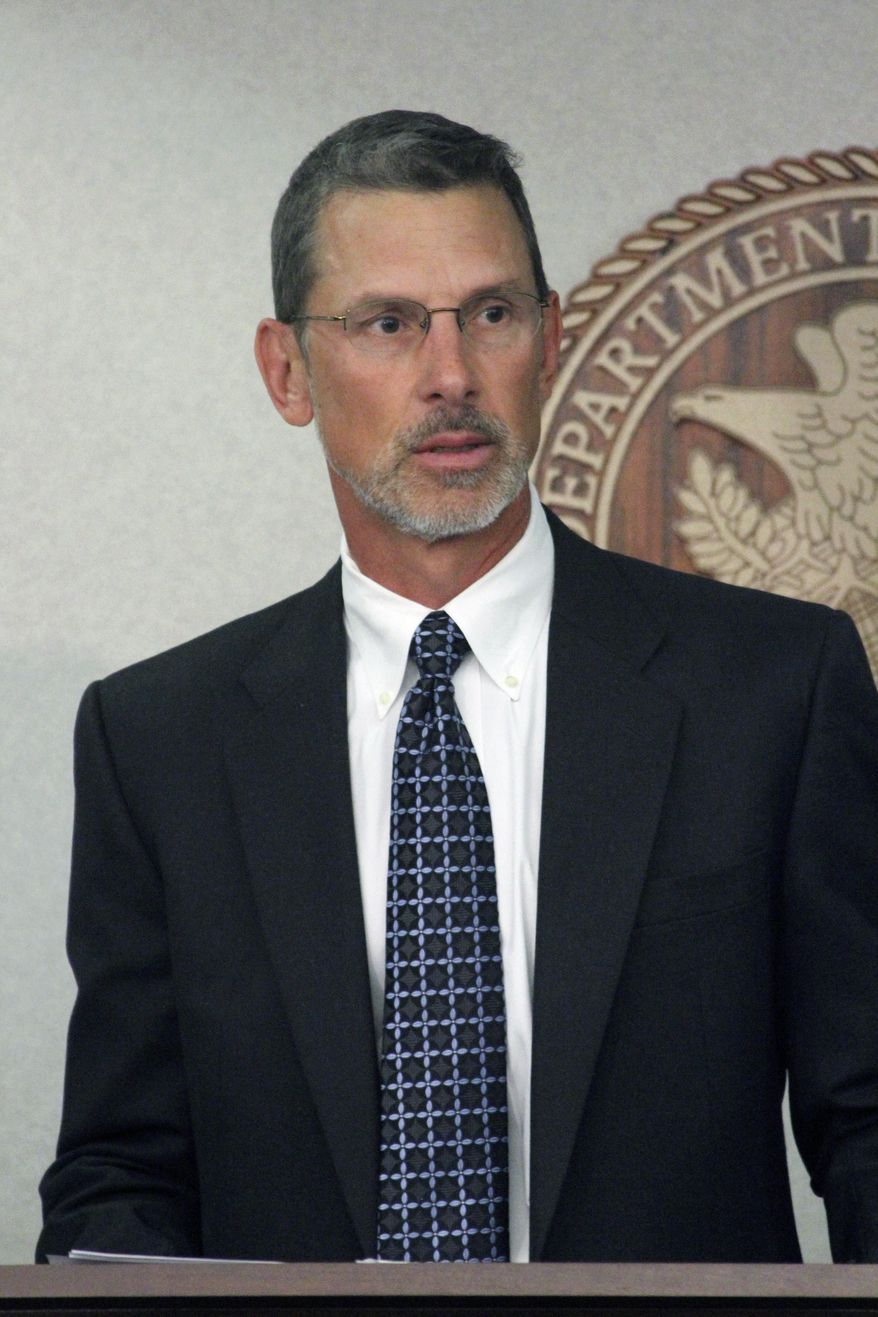 Steve Skrocki, an assistant U.S. Attorney in Alaska, and lead prosecutor, speaks during a news conference Monday, Sept. 14, 2015, in Anchorage, Alaska. Karen Loeffler, the U.S. attorney in Alaska, said multiple people associated with a cable hunting show face charges related to poaching in northwest Alaska. (AP Photo/Mark Thiessen)