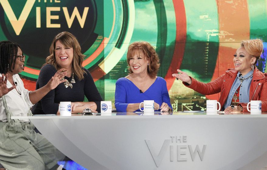In this Sept. 9, 2015 photo released by ABC, co-hosts, from left, Whoopi Goldberg, Michelle Collins, Joy Behar and Raven-Symone appear on the daytime talk show, "The View," in New York. Behar, who "retired" with great fanfare two years ago, said she was intrigued about coming back heading into an election year. Behar won't be on every day, but will be the moderator on Fridays. (Lou Rocco/ABC via AP)