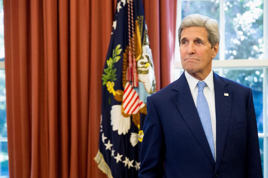Secretary of State John Kerry is seen in the Oval Office of the White House in Washington, Tuesday, Sept. 15, 2015, as President Barack Obama and Spain's King Felipe VI conclude a bilateral meeting. (AP Photo/Andrew Harnik)