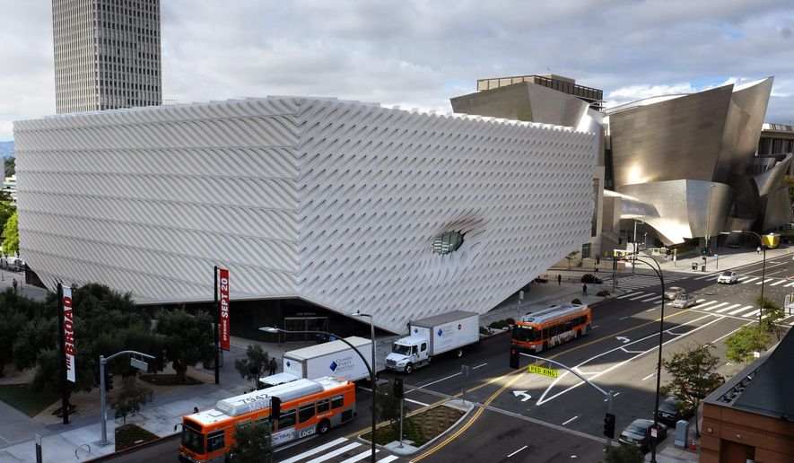 This Tuesday, Sept. 15, 2015 photo shows a view of the new Broad Museum in downtown Los Angeles. Billionaire philanthropist Eli Broad gives his latest gift to Los Angeles when The Broad, a $140 million museum built to hold some of the greatest pop-art works ever created, opens on Sept. 20, in the city’s burgeoning downtown cultural center. (AP Photo/Richard Vogel)
