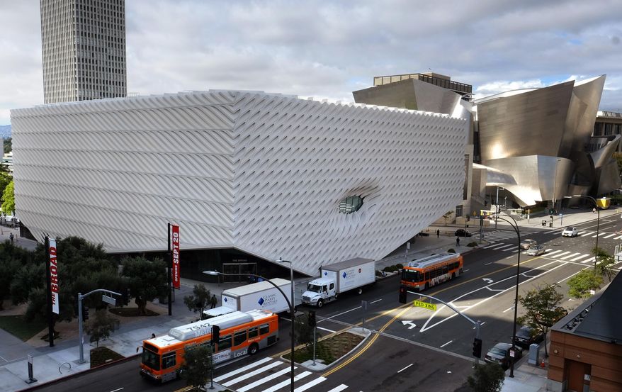 This Tuesday, Sept. 15, 2015 photo shows a view of the new Broad Museum in downtown Los Angeles. Billionaire philanthropist Eli Broad gives his latest gift to Los Angeles when The Broad, a $140 million museum built to hold some of the greatest pop-art works ever created, opens on Sept. 20, in the city’s burgeoning downtown cultural center. (AP Photo/Richard Vogel)