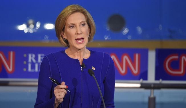 Carly Fiorina&#x27;s calm and firm grasp of policy, her coy counterattacks on Donald Trump and her forceful presentation of specific ideas made a clear case she belongs on the main stage going forward. (Associated Press)