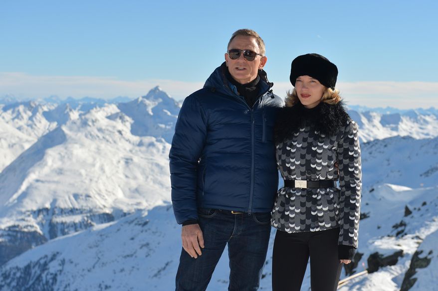 FILE - In this Wednesday, Jan. 7, 2015 file photo, actors Daniel Craig and Lea Seydoux, right, pose during a photo call in Soelden, Austrian province of Tyrol, where scenes for the new James Bond 007 movie Spectre, will be produced. 007 star Daniel Craig and the film's other luminaries will be at the October world premiere of the new James Bond film "Spectre", and Palace officials said Wednesday Sept. 16, 2015, they will be joined on the red carpet by Prince William and his wife Kate and Prince Harry. (AP Photo/Kerstin Joensson, File)