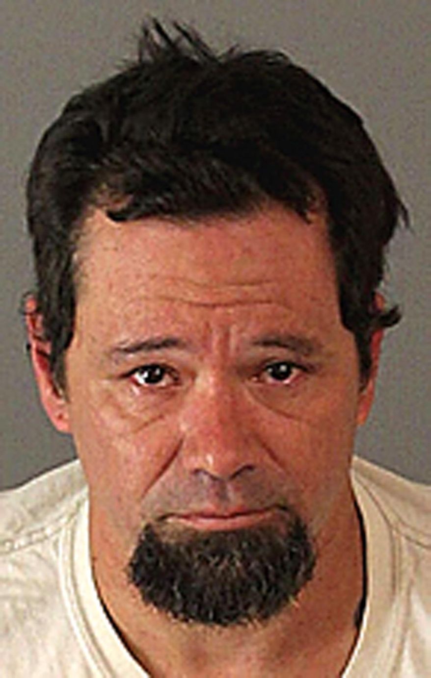 This undated booking photo provided by the Riverside County Sheriff's department show Jason Johnson who was taken into custody after allegedly breaking in to a Jurupa Valley, Calif., animal shelter and stealing dogs who were quarantined and waiting for hearings which could have caused them to be euthanized. The Press-Enterprise reports that Riverside County Sheriff's officials announced the suspect Wednesday, Sept. 16, 2015, in the break-in. (Riverside County Sheriffs Department via AP)