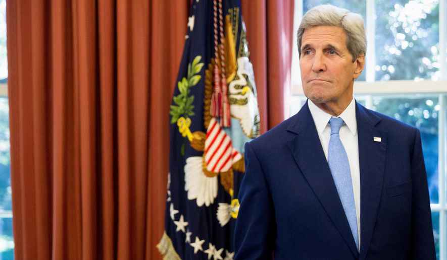 FILE - In thbis Sept. 15, 2015 file photo, Secretary of State John Kerry is seen in the Oval Office of the White House in Washington. The Obama administration is weighing an offer from Russia to have military-to-military talks and meetings on the situation in Syria amid increasing U.S. concern and uncertainty about Russia’s military buildup there, Kerry said Wednesday. (AP Photo/Andrew Harnik, File)