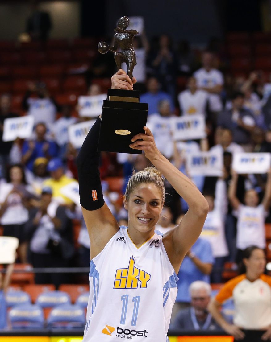Chicago Sky forward Elena Delle Donne holds the MVP trophy before the Game 1 of the WNBA basketball Eastern Conference semifinals between the Sky and the Indiana Fever, Thursday, Sept. 17, 2015, in Chicago. (AP Photo/Kamil Krzaczynski) **FILE**