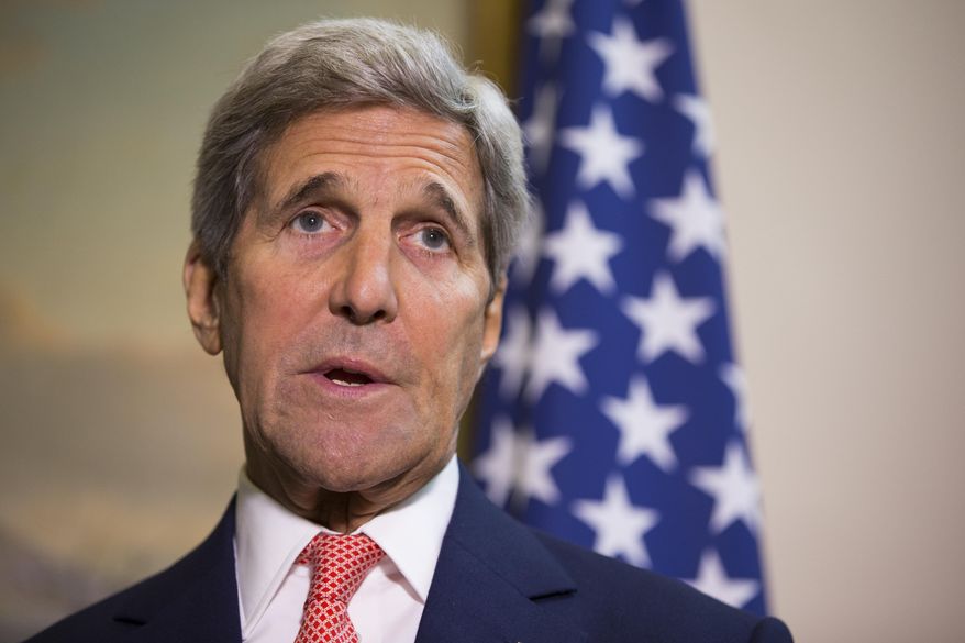 Secretary of State John Kerry answers a question about the ongoing crisis in Syria during a news conference with British Foreign Secretary Philip Hammond, on Saturday, Sept. 19, 2015, in London. (AP Photo/Evan Vucci, Pool)