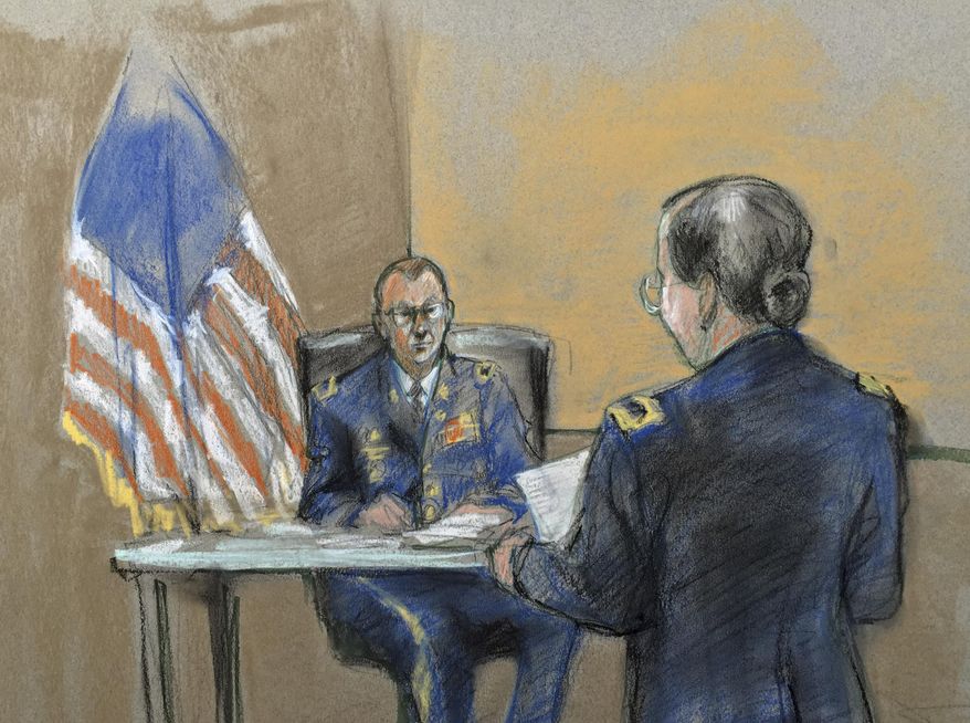 Hearing officer Lt. Col. Mark A. Visger, left, listens to prosecutor Maj. Margaret V. Kurz during a preliminary hearing to determine if Army Sgt. Bowe Bergdahl will be court-martialed, Friday, Sept. 18, 2015, at Fort Sam Houston, Texas. Bergdahl, who left his post in Afghanistan and was held by the Taliban for five years, is charged with desertion and misbehavior before the enemy. (Brigitte Woosley via AP)