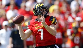 Maryland quarterback Caleb Rowe throws to a receiver in the first half of an NCAA college football game against South Florida, Saturday, Sept. 19, 2015, in College Park, Md. (AP Photo/Patrick Semansky)
