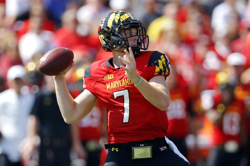 Maryland quarterback Caleb Rowe throws to a receiver in the first half of an NCAA college football game against South Florida, Saturday, Sept. 19, 2015, in College Park, Md. (AP Photo/Patrick Semansky)