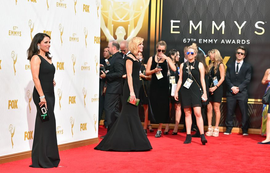 Julia Louis-Dreyfus arrives at the 67th Primetime Emmy Awards on Sunday, Sept. 20, 2015, at the Microsoft Theater in Los Angeles. (Photo by Jordan Strauss/Invision/AP)