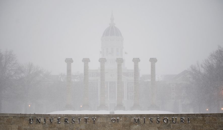 Royce de R. Barondes, an associate professor of law at the University of Missouri, is challenging the campus&#39; policy that &quot;the possession of firearms on university property is prohibited except in regularly approved programs or by university agents or employees in the line of duty.&quot; (Associated Press)