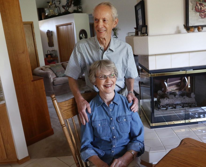 Joe Clyde and wife Margene Clyde pose for a photograph in their Winchester, Ore. home on Thursday Sept. 10, 2015. Last month, Joe Clyde’s neurologist told him he has the slowest-progressing case of Parkinson’s disease he’s ever seen. The slow progression could be the result of what he’s eating. Or, more to the point, what he’s not eating. (Michael Sullivan/The News-Review via AP)