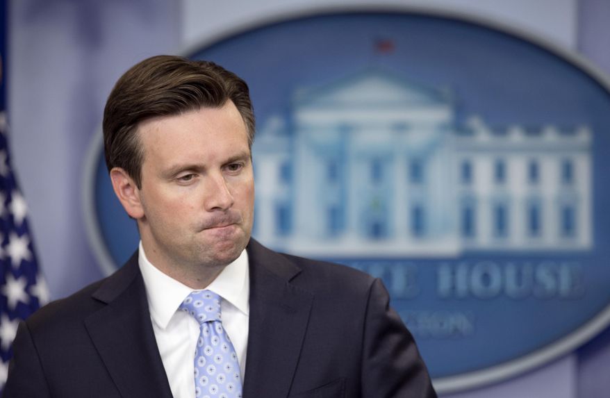White House press secretary Josh Earnest listens to a reporter's question during a daily press briefing in the Brady press briefing room of the White House in Washington, Monday, Sept. 21, 2015. Earnest spoke about U.S. trade embargo against Cuba. (AP Photo/Manuel Balce Ceneta)