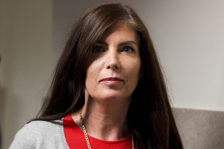 FILE - In this Aug. 24, 2015 file photo, Pennsylvania Attorney General Kathleen Kane departs after her preliminary hearing at the Montgomery County courthouse in Norristown, Pa. The state's highest court on Monday, Sept, 21, 2015, ordered the temporary suspension of Kane's law license, a step that could trigger a Senate vote to remove her as she faces criminal charges. (AP Photo/Matt Rourke, File)