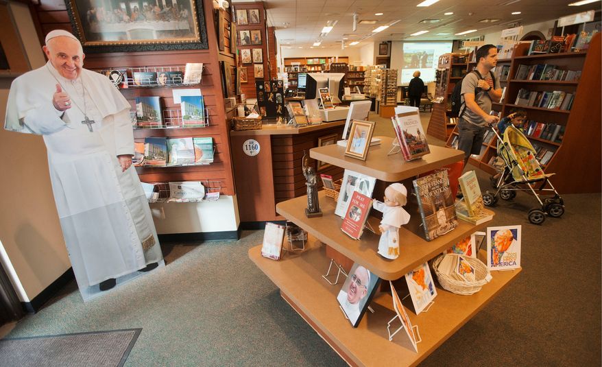 A life-size cutout out of Pope Francis is displayed at the Catholic Information Center (CIC) in Washington, Monday, Sept. 21, 2015. The bookstore expects more visitors in anticipation for this week's visit by the Pontiff to Washington. (AP Photo/Pablo Martinez Monsivais)